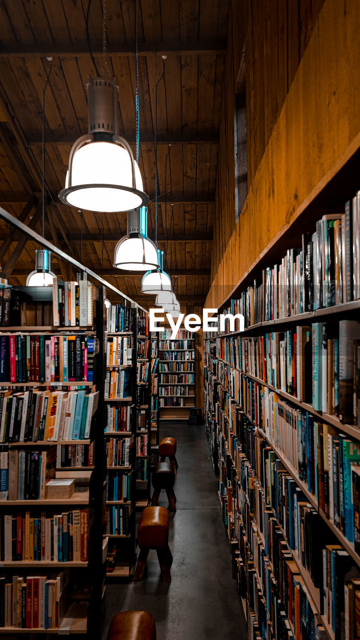 low angle view of man standing in library