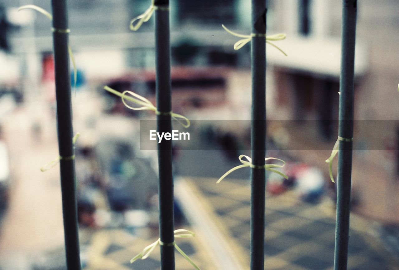 Ribbon tied on metal grate