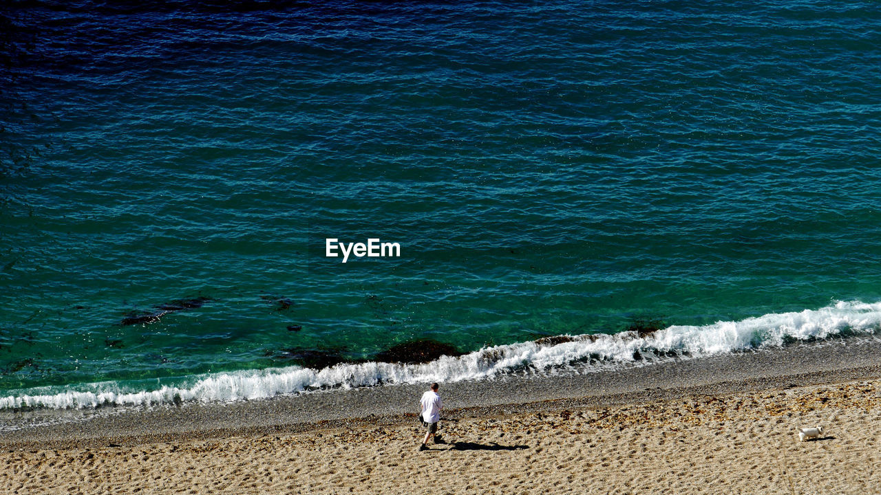 Man walking at beach