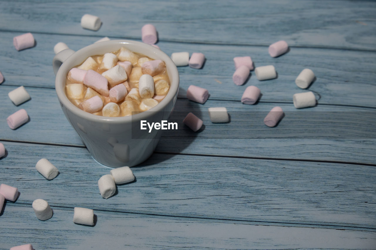 high angle view of pills in bowl on table