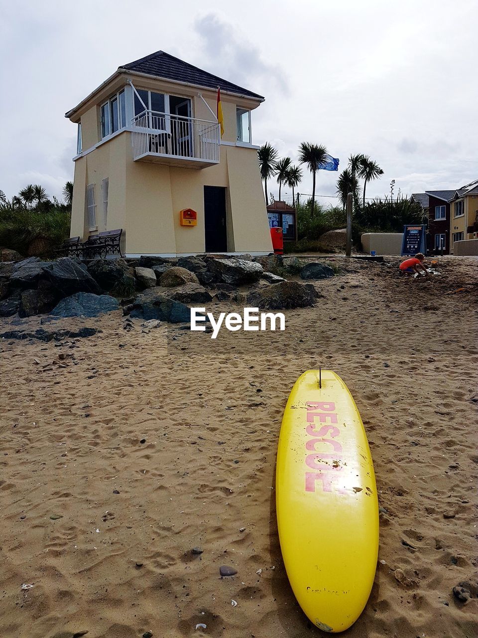 YELLOW AND HOUSE ON BEACH