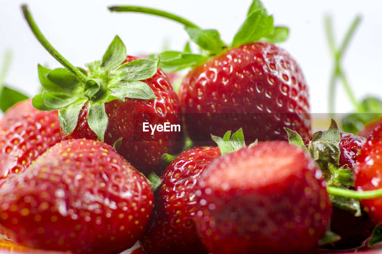 CLOSE-UP OF STRAWBERRIES WITH STRAWBERRY