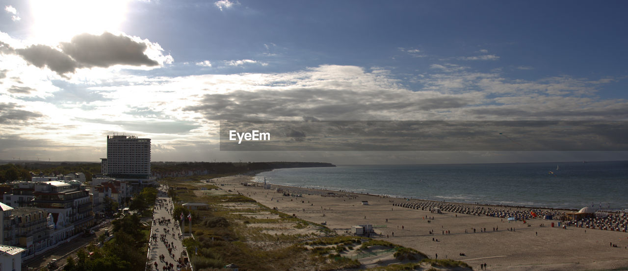 PANORAMIC VIEW OF BEACH AGAINST SKY IN CITY
