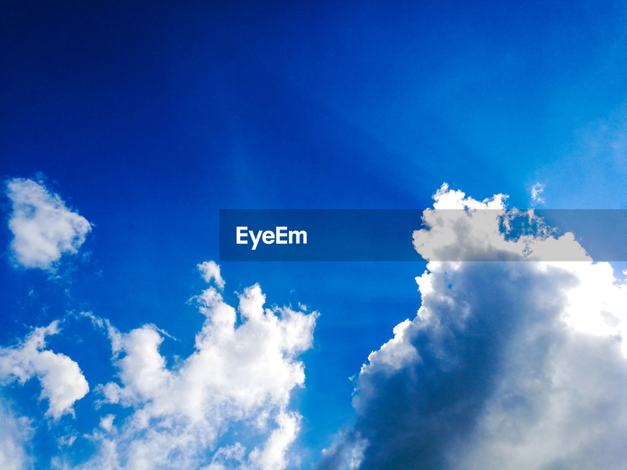 LOW ANGLE VIEW OF BLUE SKY AND CLOUDS