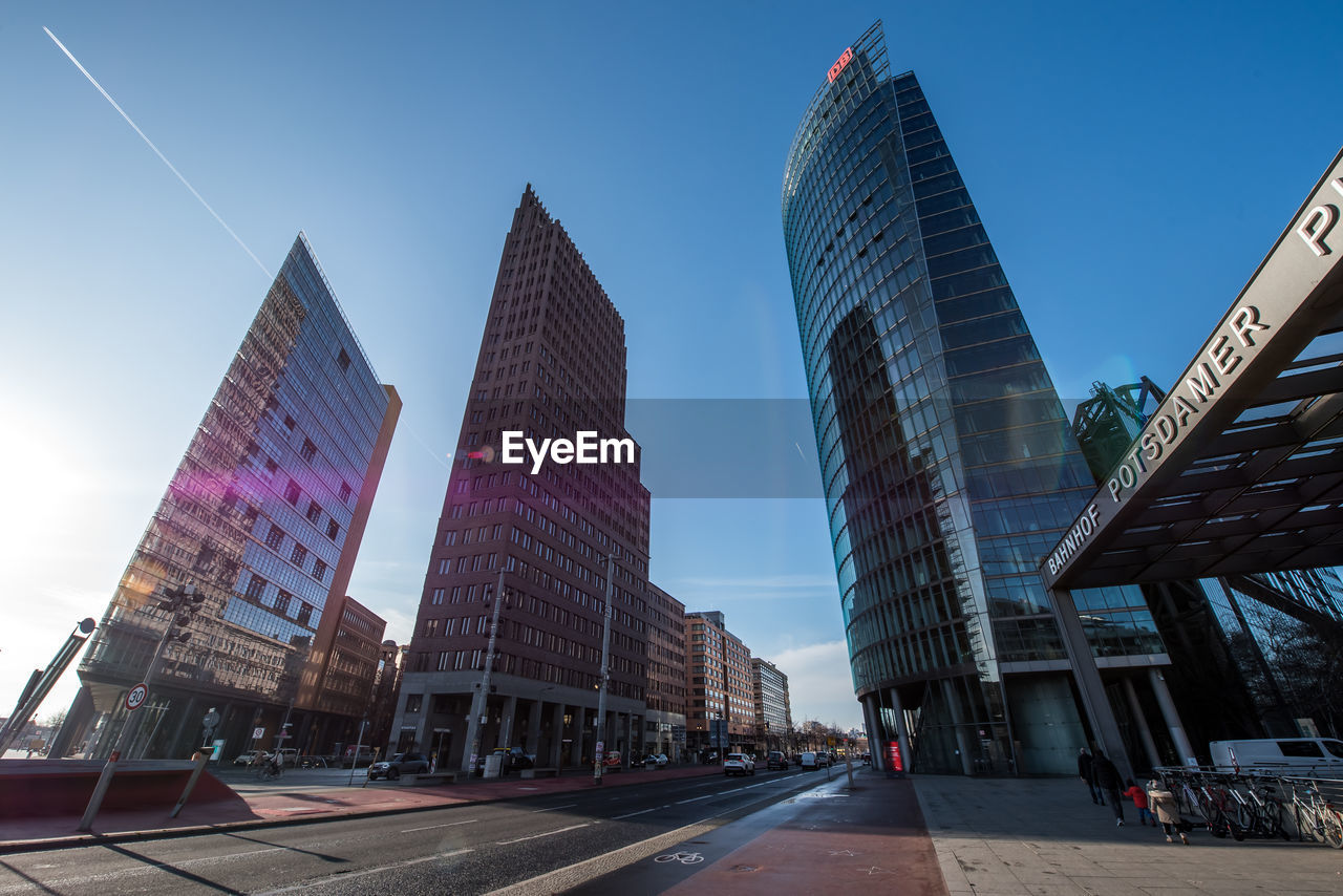 LOW ANGLE VIEW OF BUILDINGS AGAINST CLEAR SKY