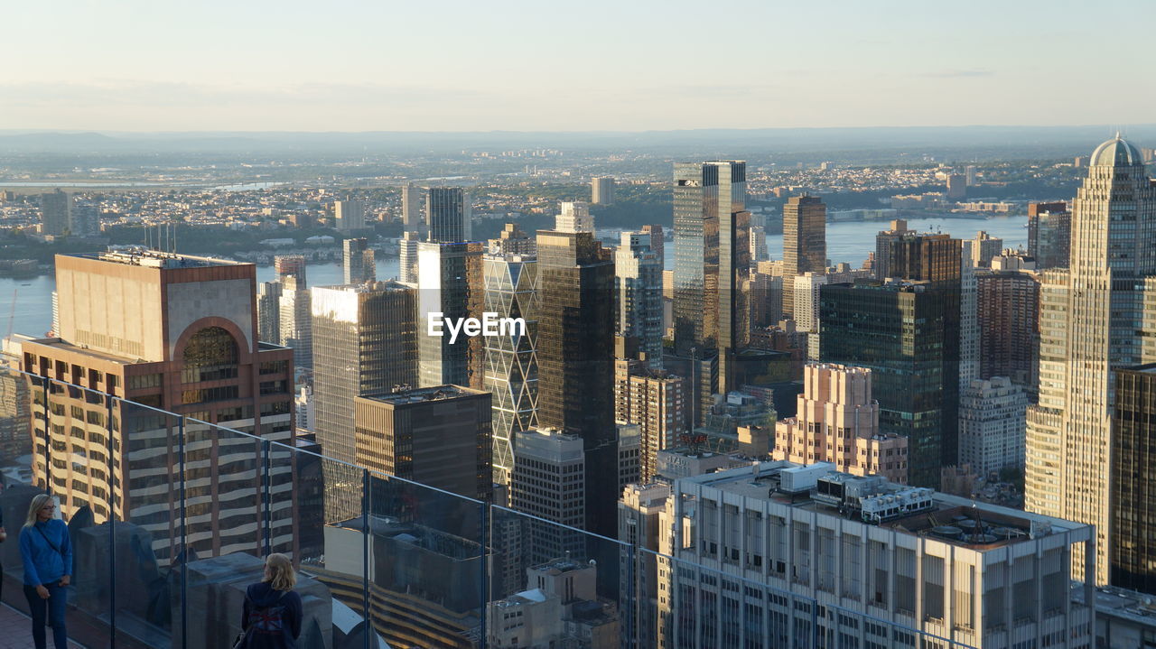 High angle view of buildings in city against sky