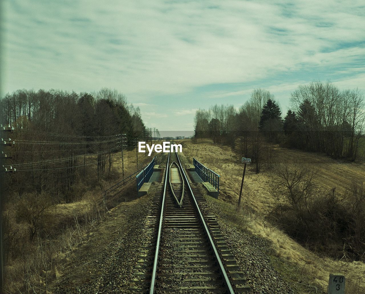 Railroad tracks against sky