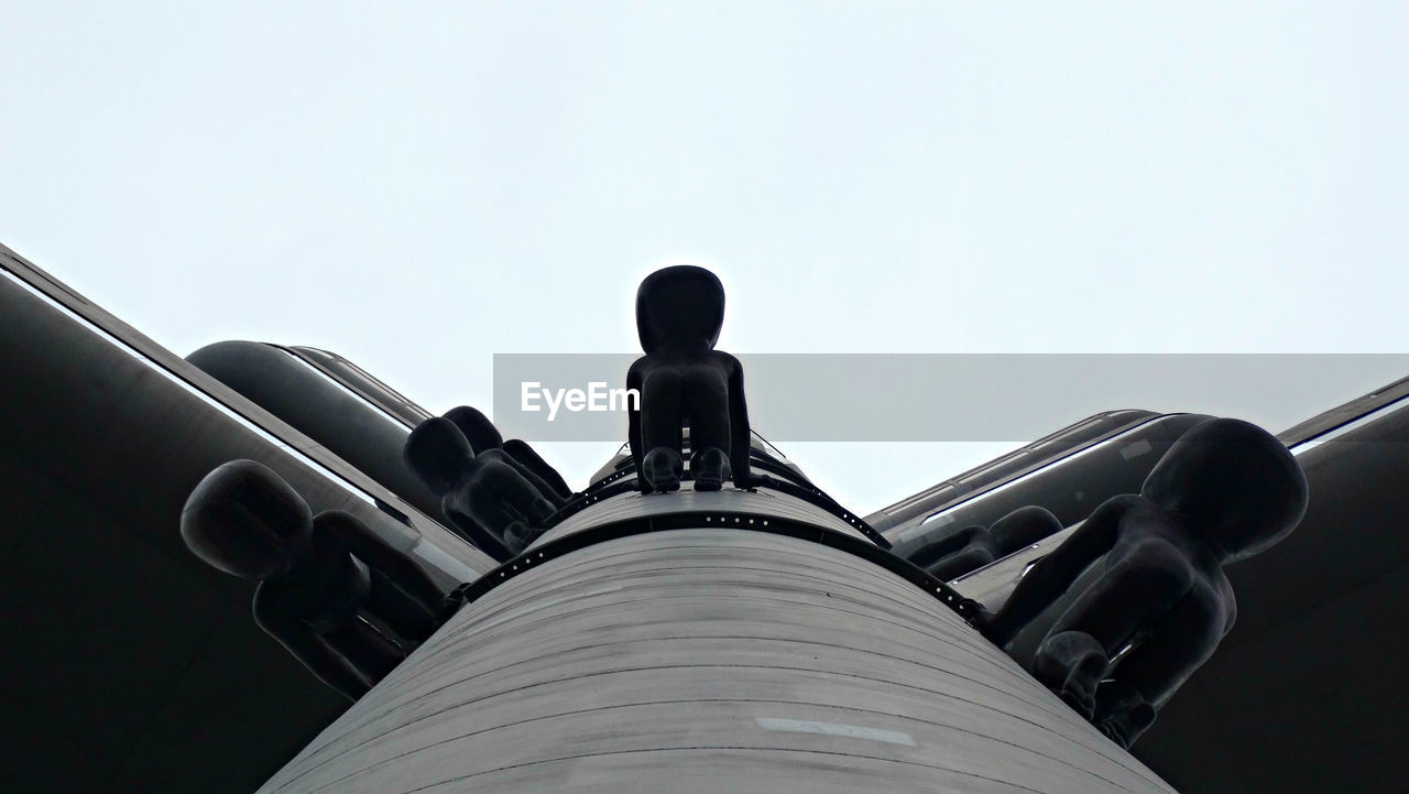 LOW ANGLE VIEW OF BUILT STRUCTURE AGAINST CLEAR SKY