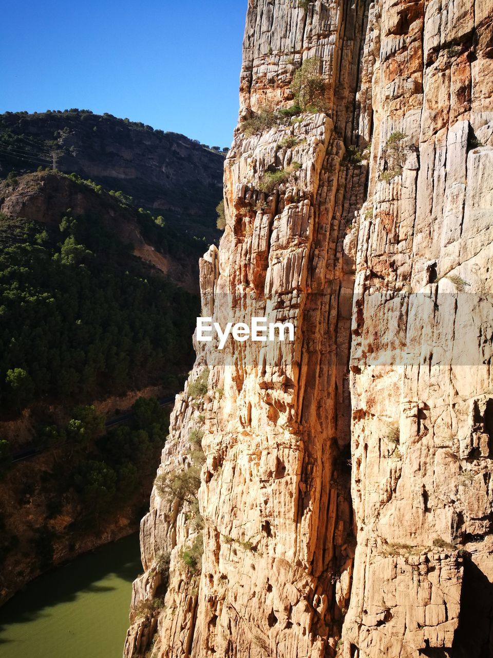 Rock formations on mountain against sky