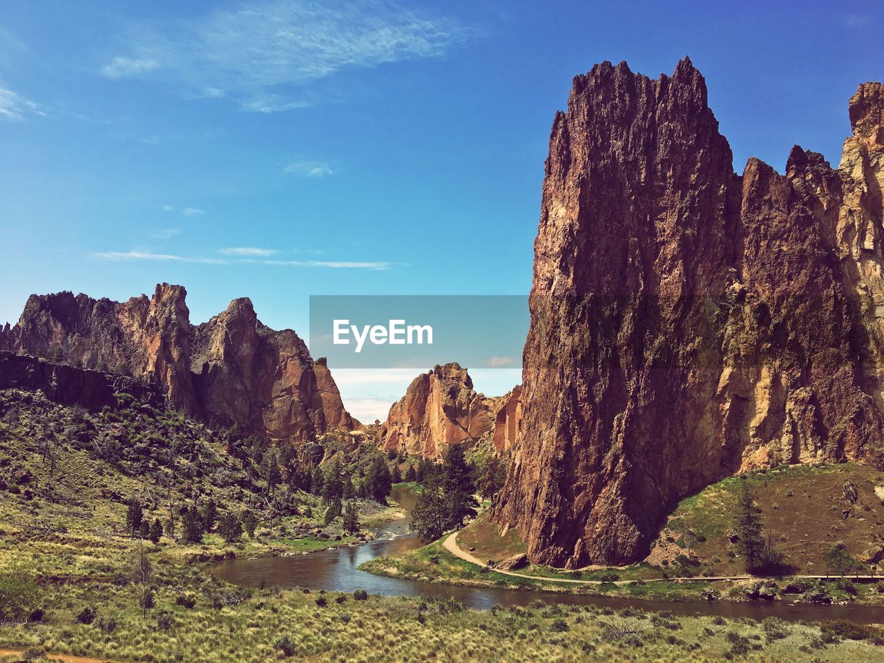 Panoramic view of rock formations on landscape against sky