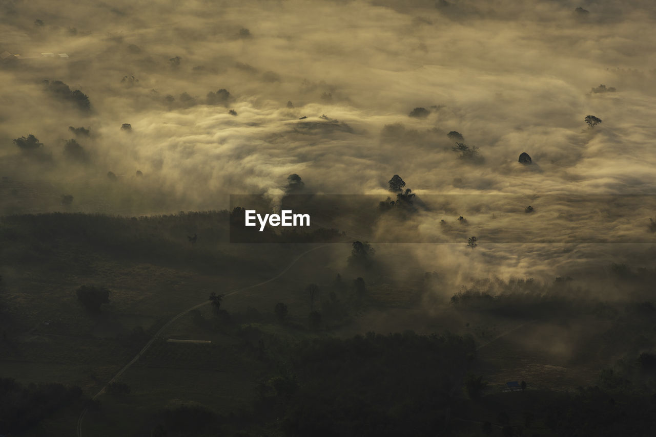 Aerial view of landscape against sky during sunset