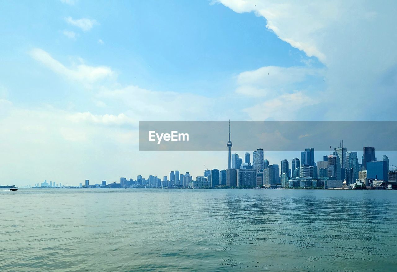 Scenic view of sea against sky, skyline of toronto, canada