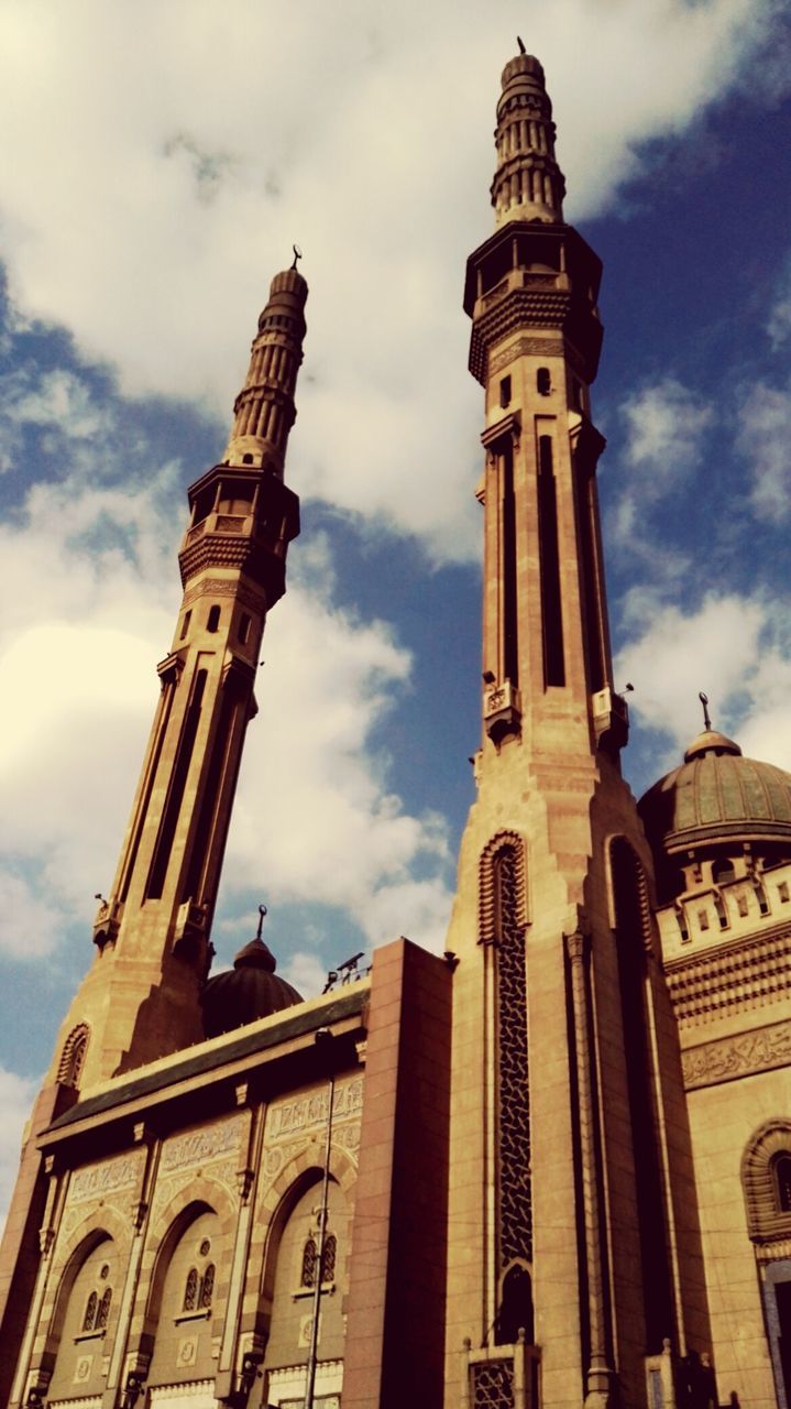 LOW ANGLE VIEW OF BELL TOWER AGAINST THE SKY