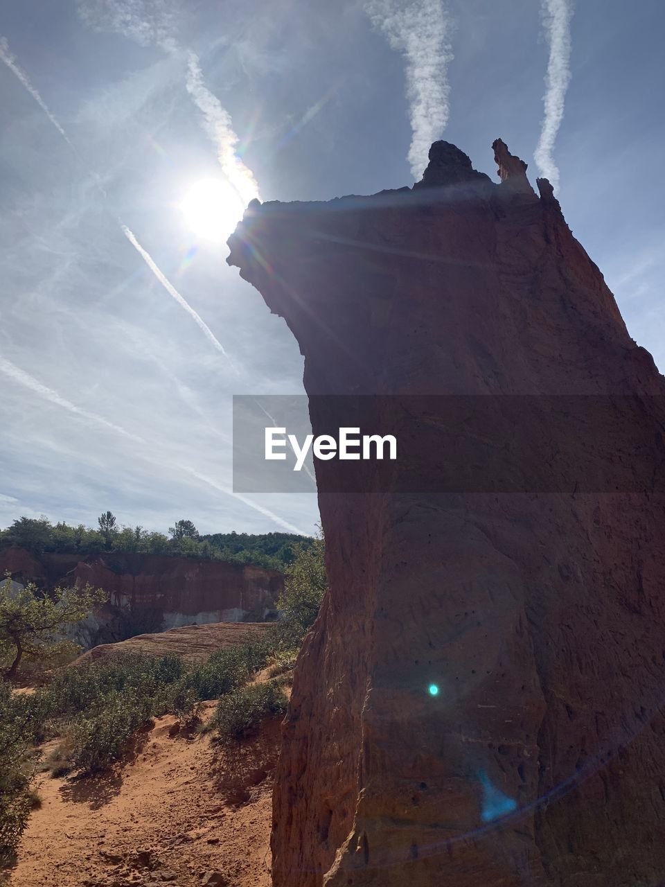 SCENIC VIEW OF LAND AGAINST BRIGHT SKY