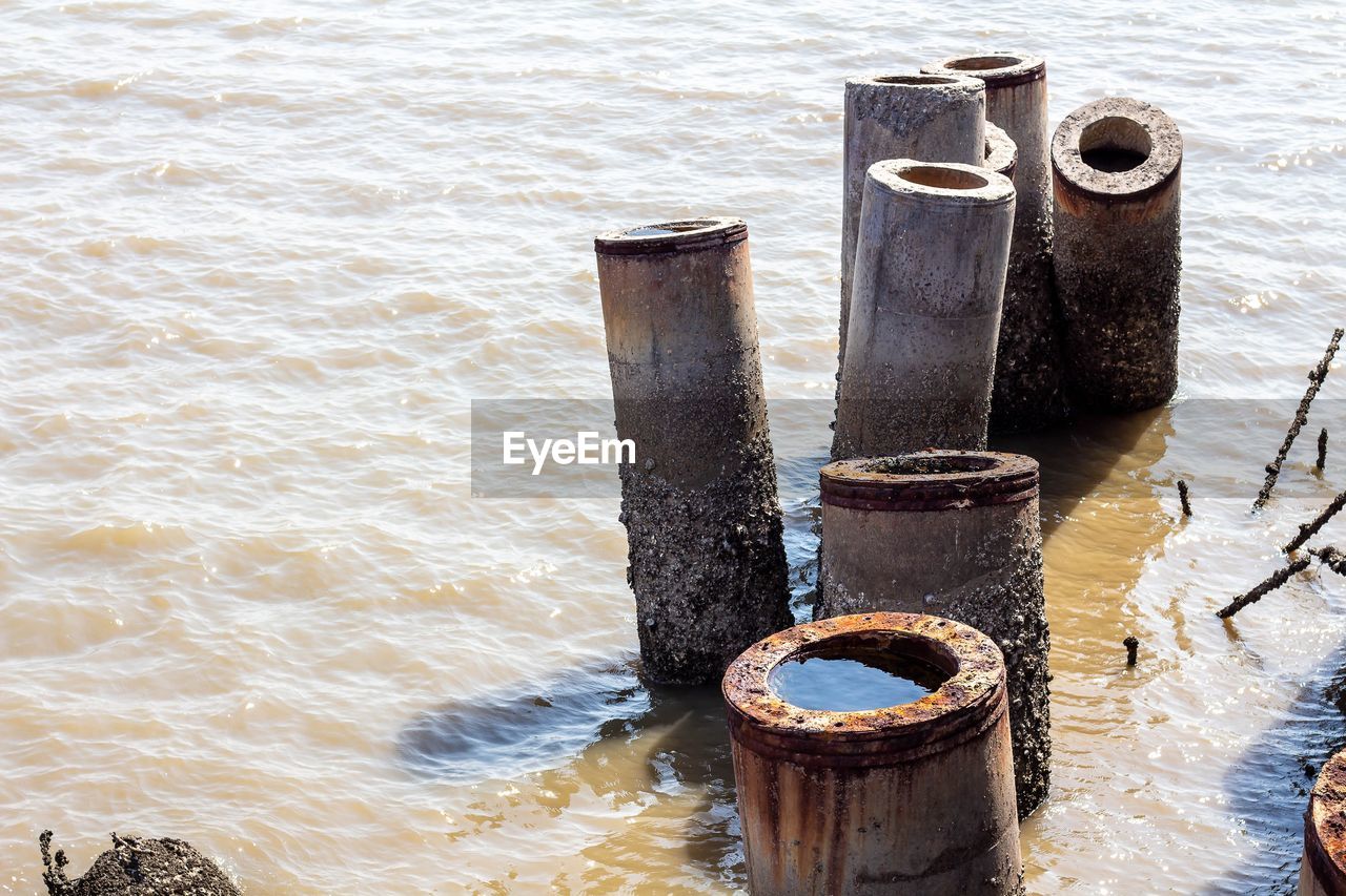 water, nature, wood, no people, day, post, high angle view, metal, outdoors, sea, rusty, iron, land, beach, container