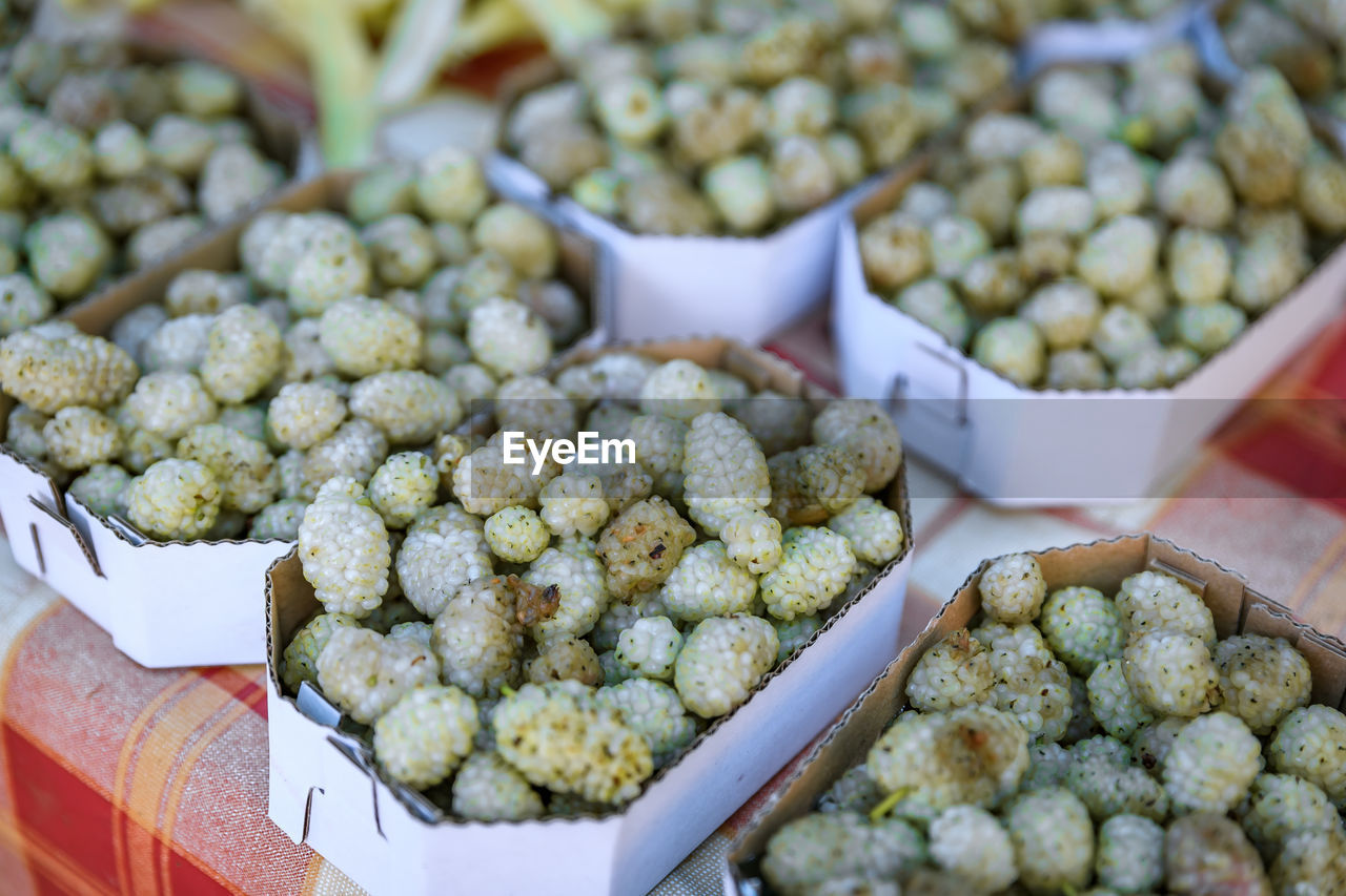 food and drink, food, market, produce, freshness, retail, market stall, healthy eating, plant, large group of objects, business finance and industry, vegetable, abundance, business, no people, wellbeing, dish, container, for sale, small business, selective focus, day, close-up, fruit, store