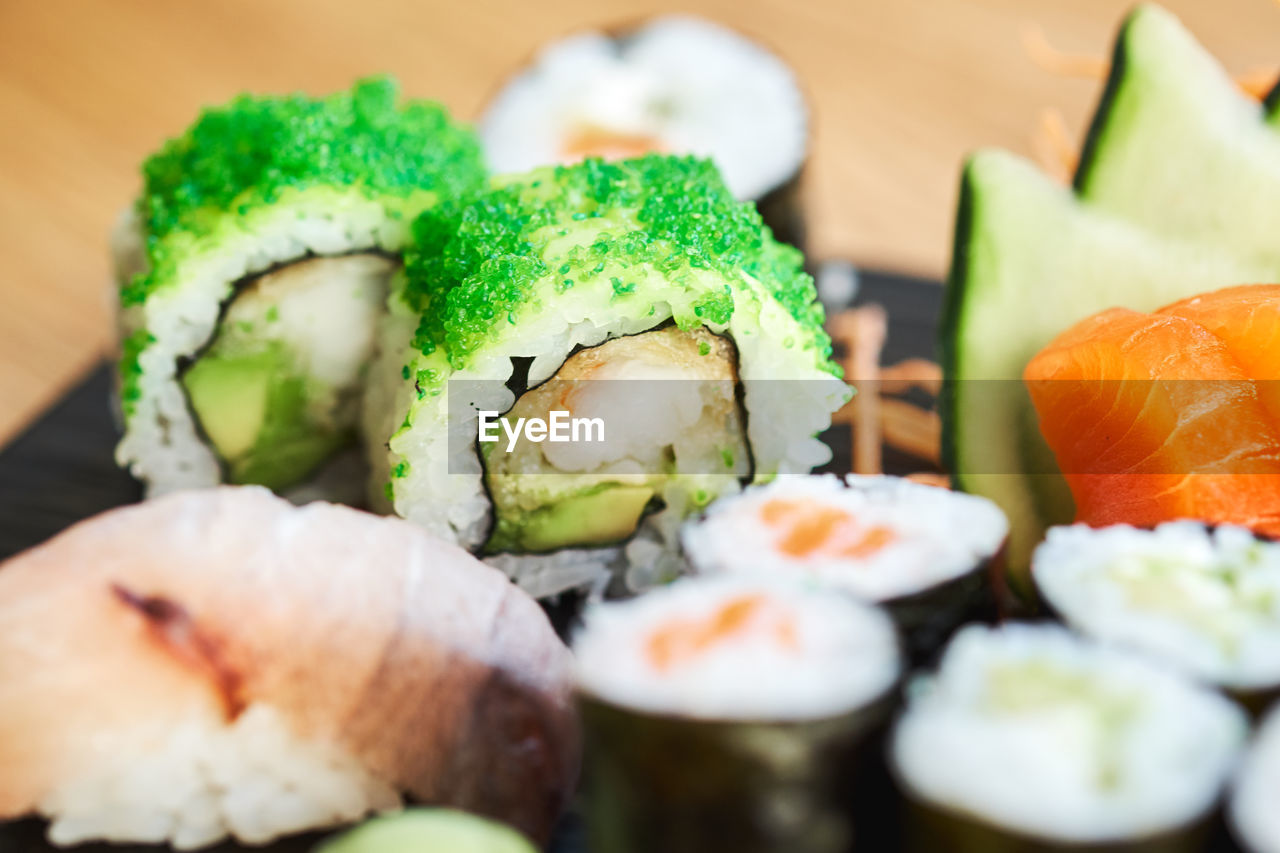 CLOSE-UP OF SUSHI IN TRAY