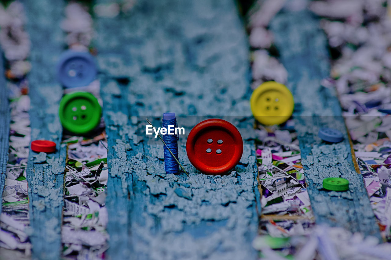 Close-up of sewing items on table