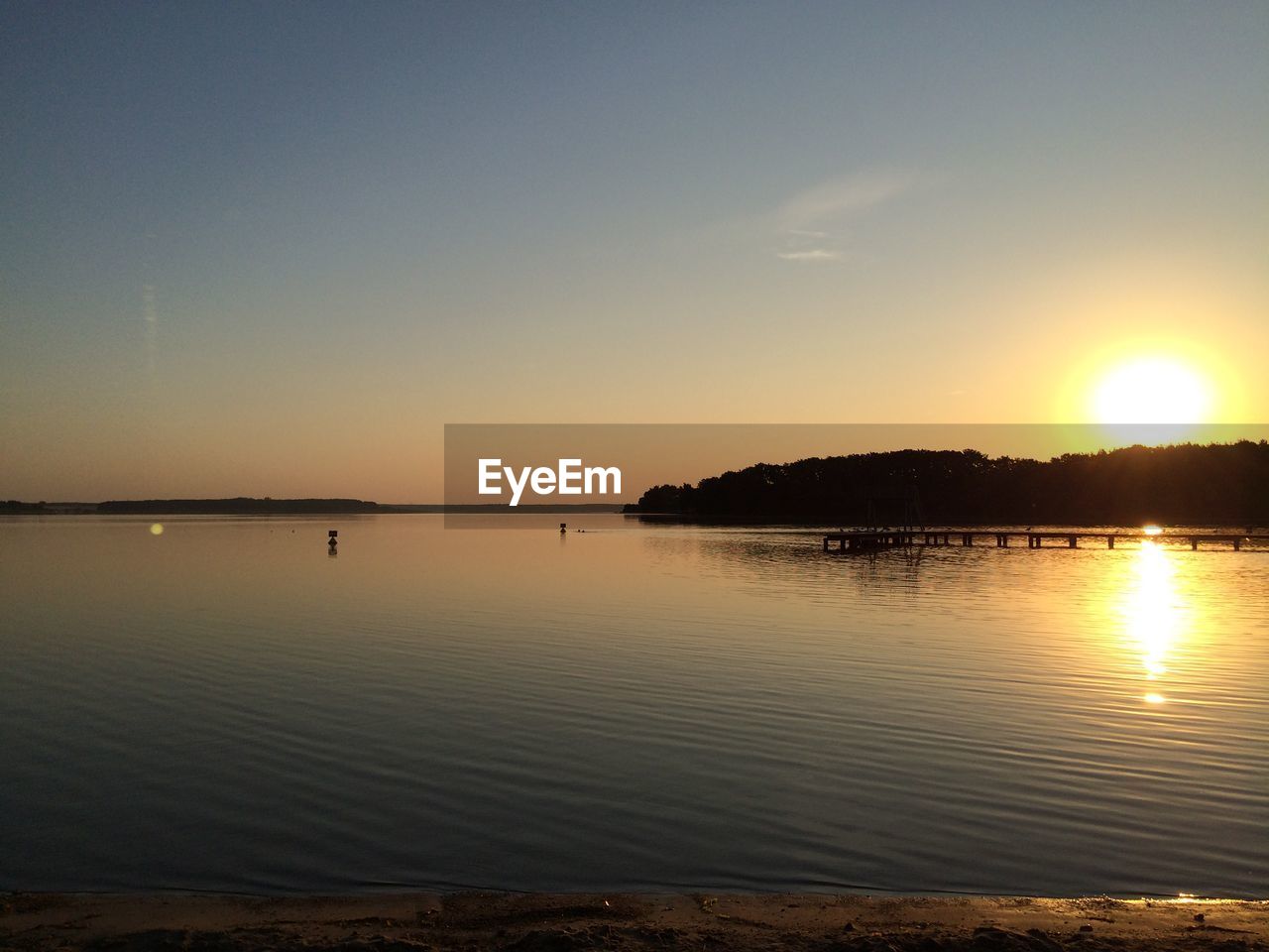 Scenic view of sunset over river