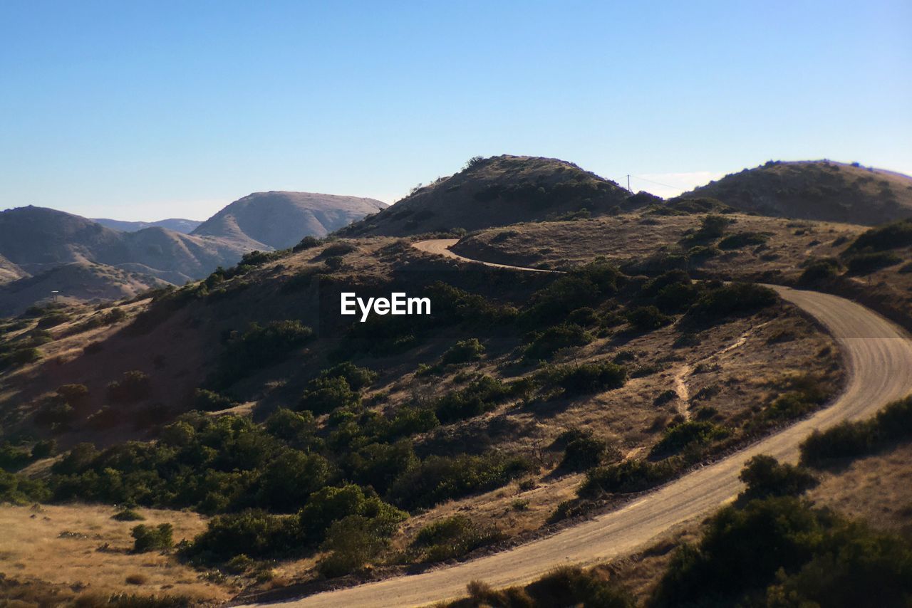 Scenic view of mountains against clear sky