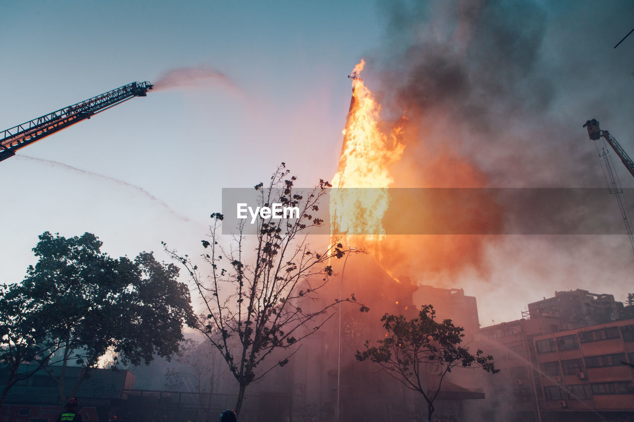 SCENIC VIEW OF FIRE AGAINST SKY