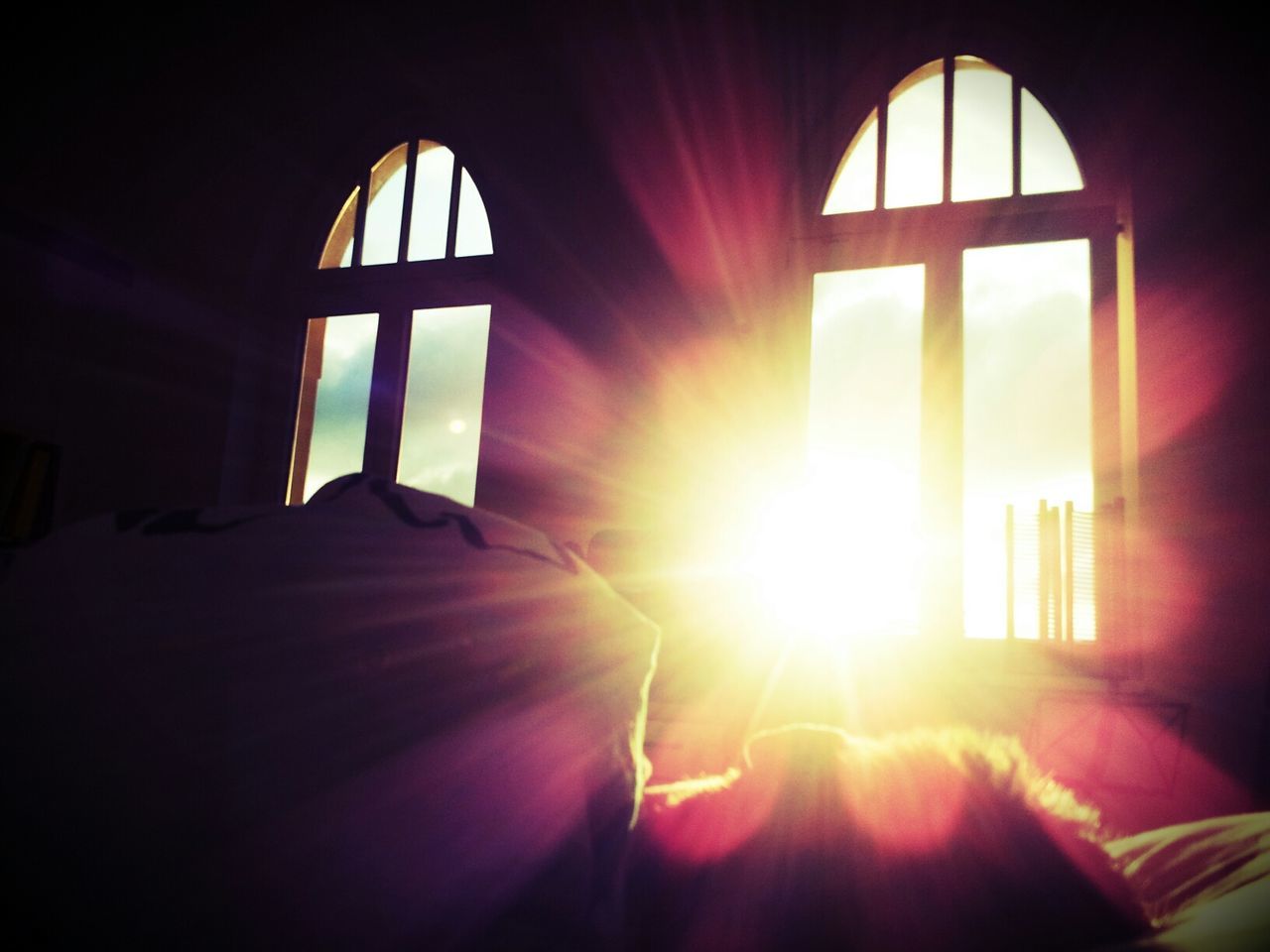 SUN SHINING THROUGH WINDOW