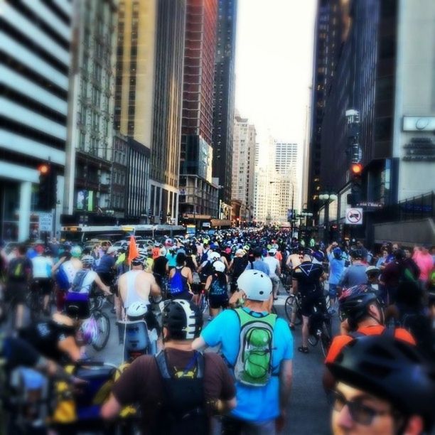 PEOPLE WALKING ON CITY STREET