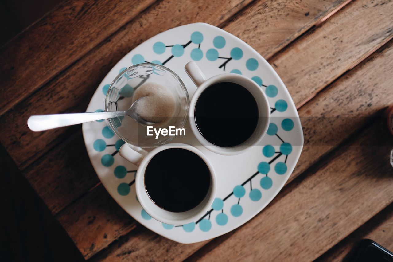 High angle view of coffee cup on table