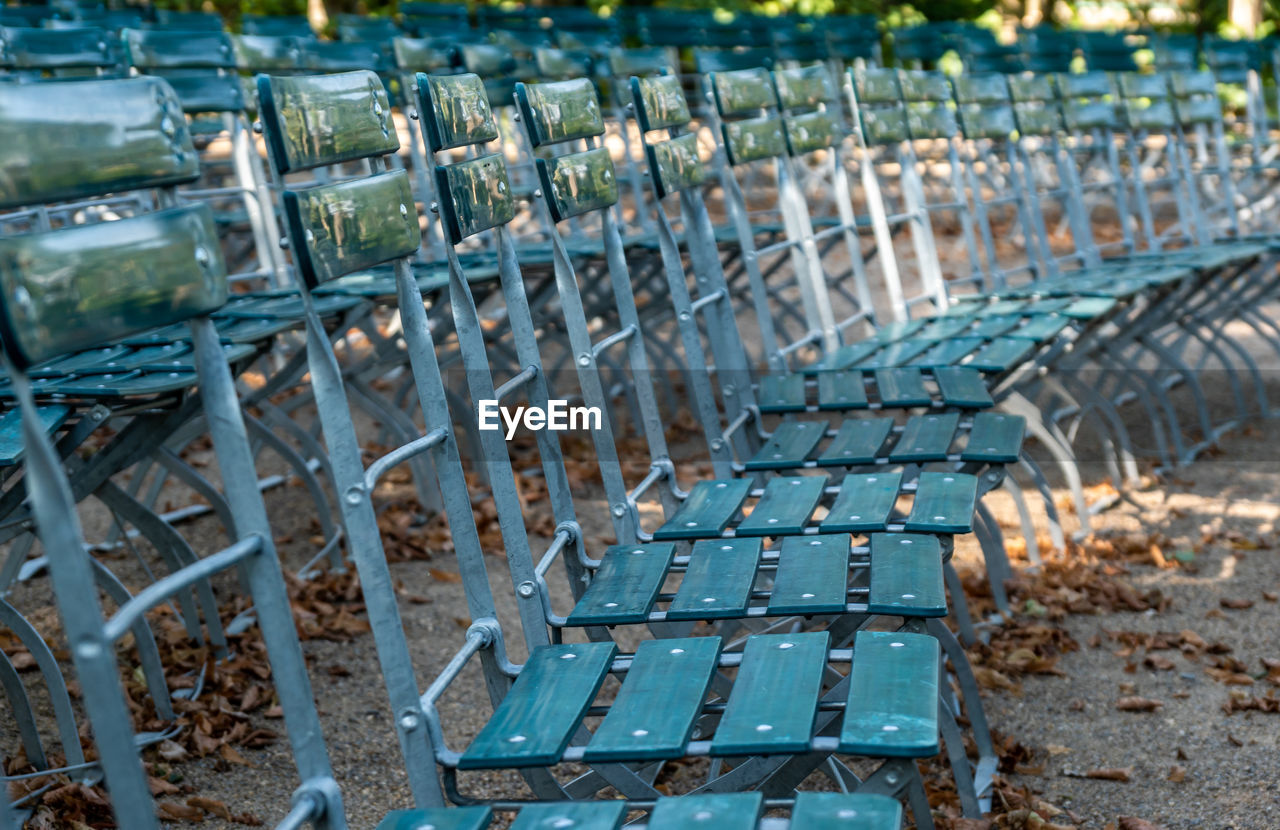 High angle view of chairs on field