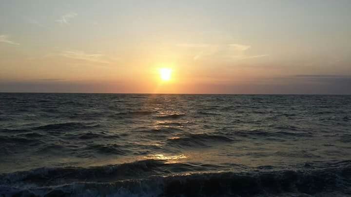 SUNSET OVER SEA