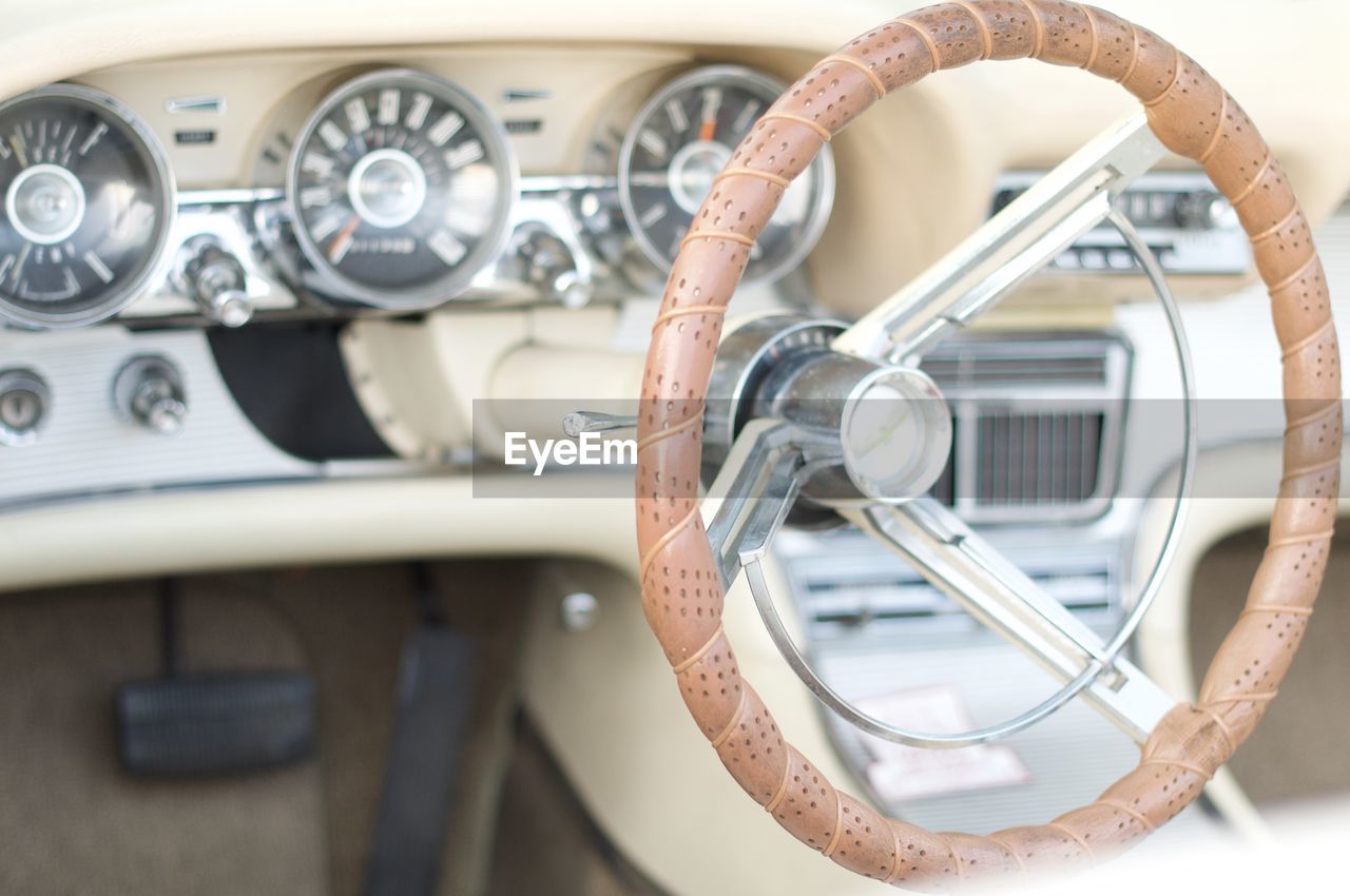 Close-up of steering wheel in vintage car