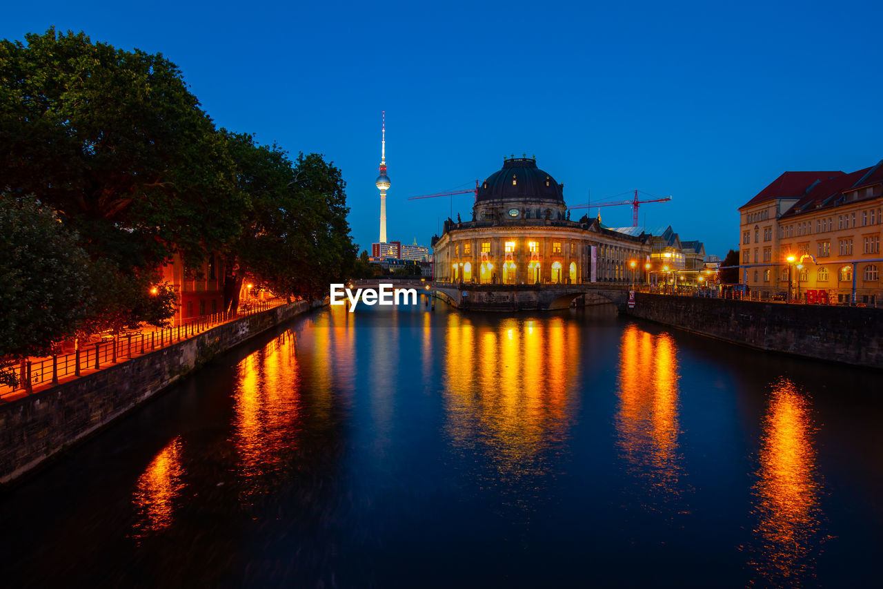 ILLUMINATED BUILDINGS BY RIVER