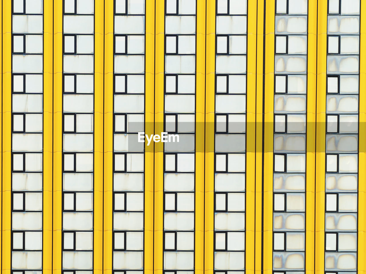 yellow, full frame, pattern, no people, line, backgrounds, architecture, font, built structure, repetition, in a row, side by side, day, window, wall - building feature, outdoors, building exterior, building, text, metal, close-up