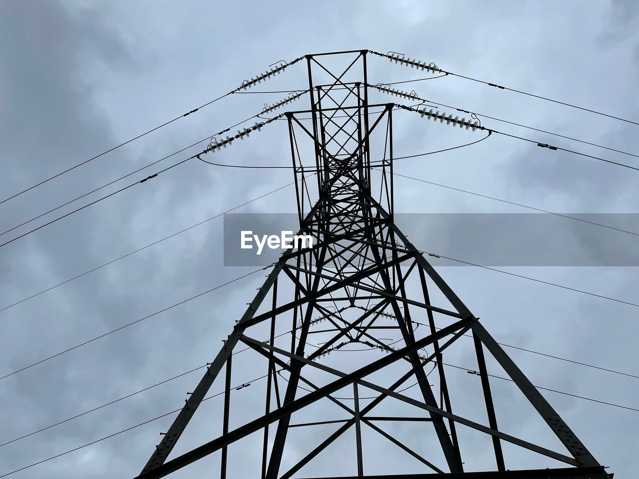 LOW ANGLE VIEW OF POWER LINES AGAINST SKY