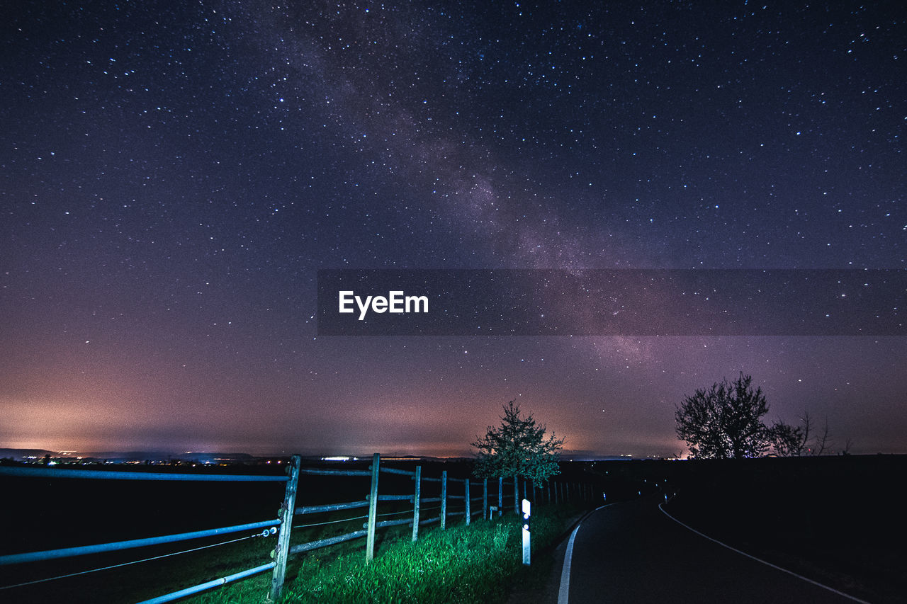 Scenic view of star field against sky at night