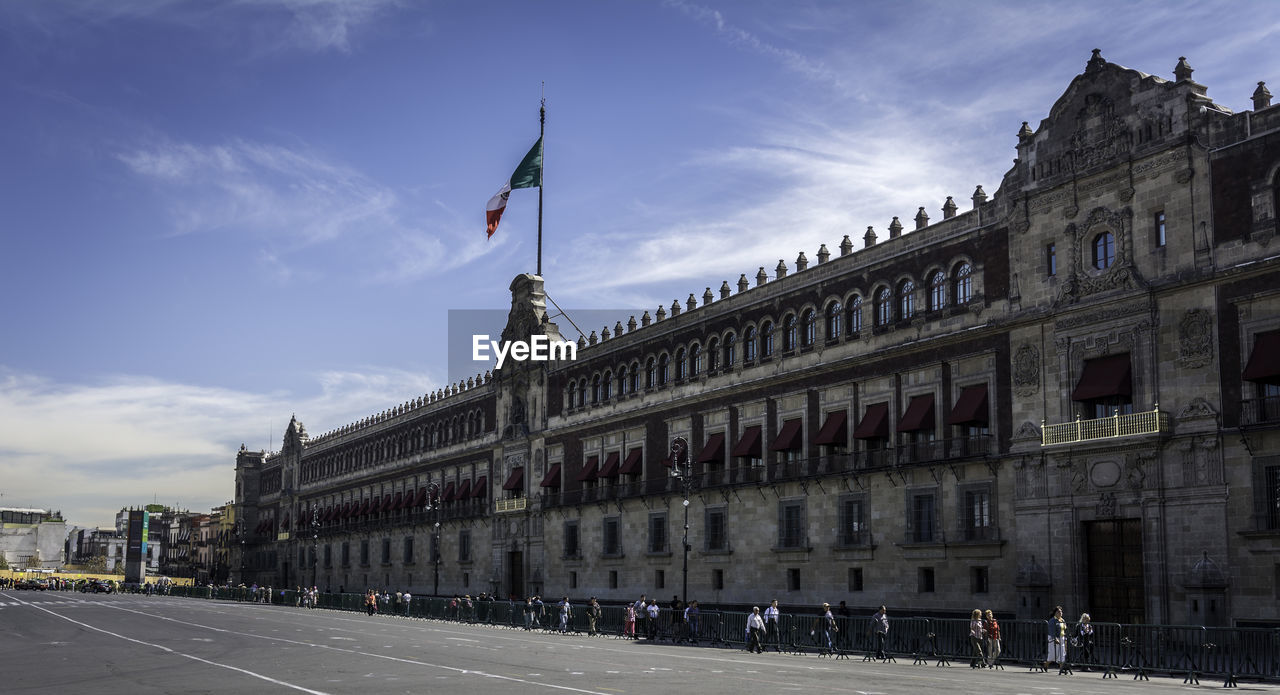 National palace in city against sky