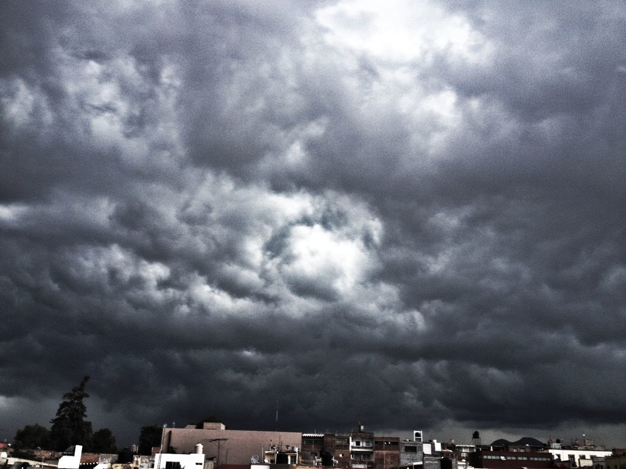 CLOUDY SKY OVER CITY