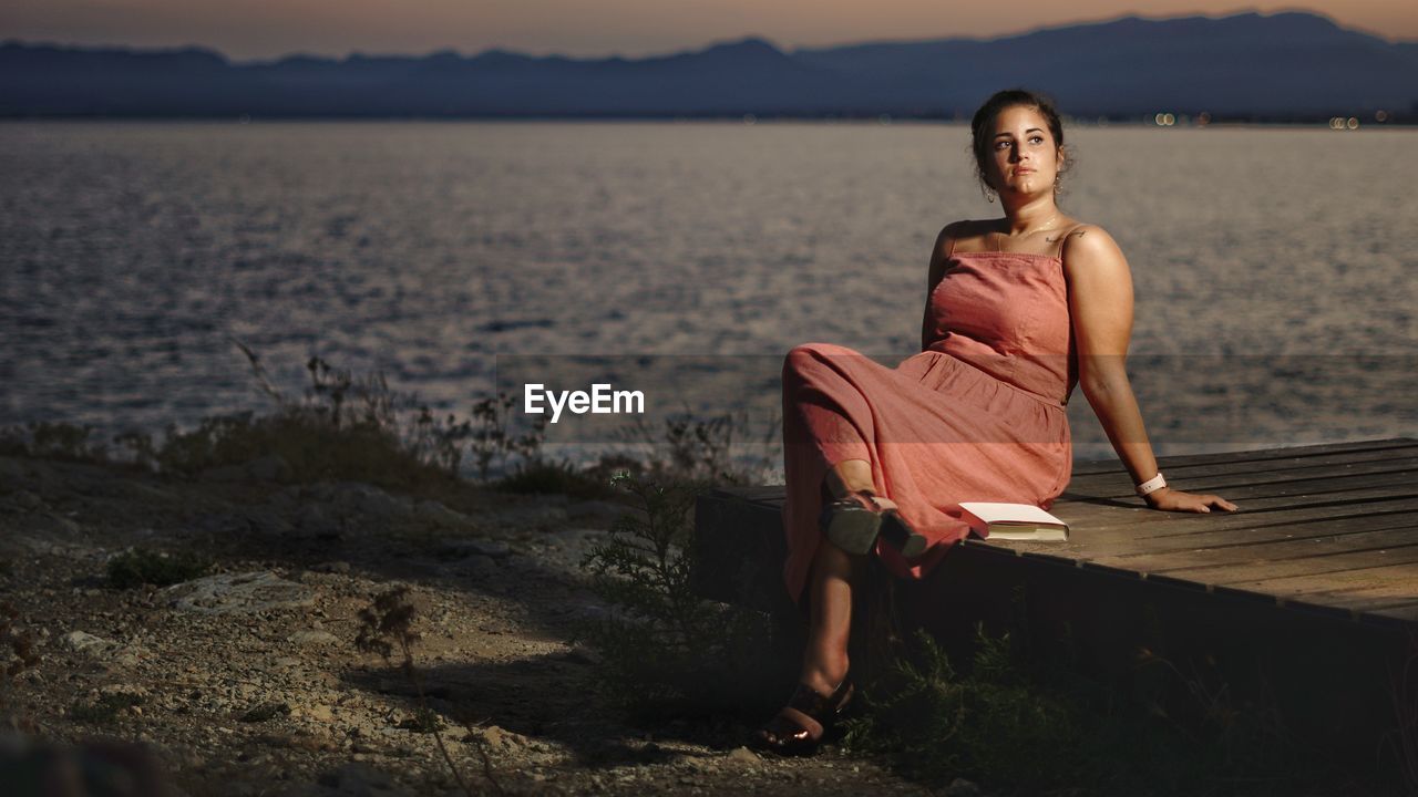 Portrait of woman on shore at beach