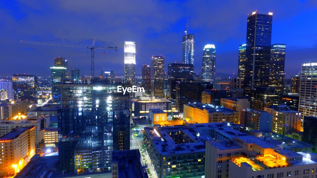 Illuminated cityscape at night