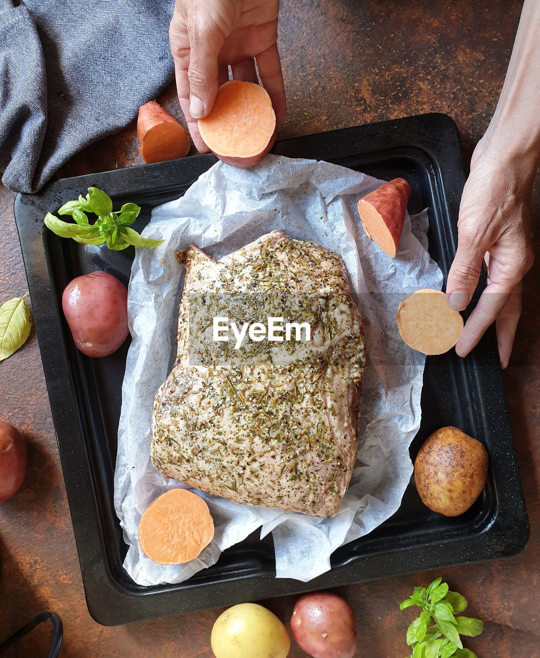 High angle view of person preparing food 