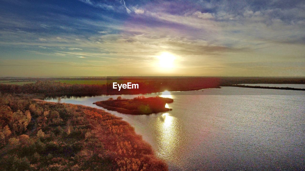 SCENIC VIEW OF SEA DURING SUNSET