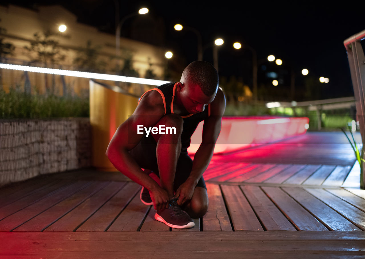 African american runner preparing for training