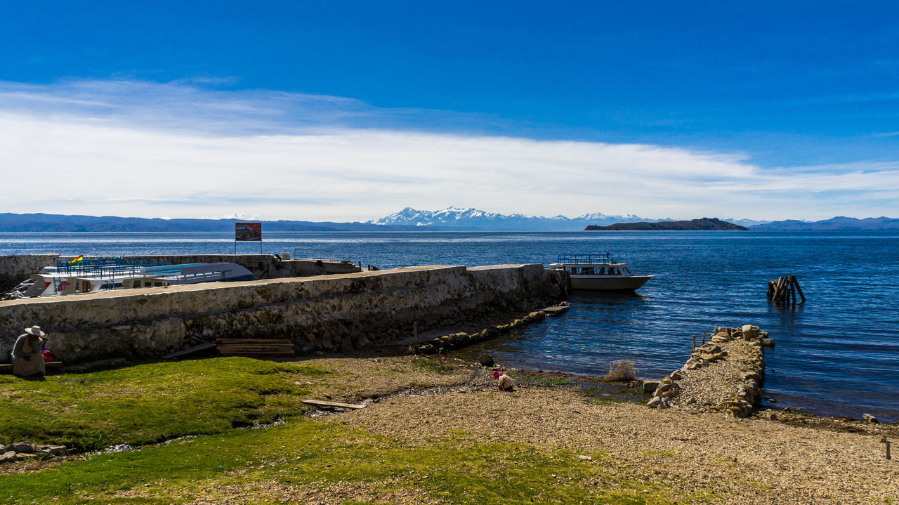 Scenic view of sea against blue sky