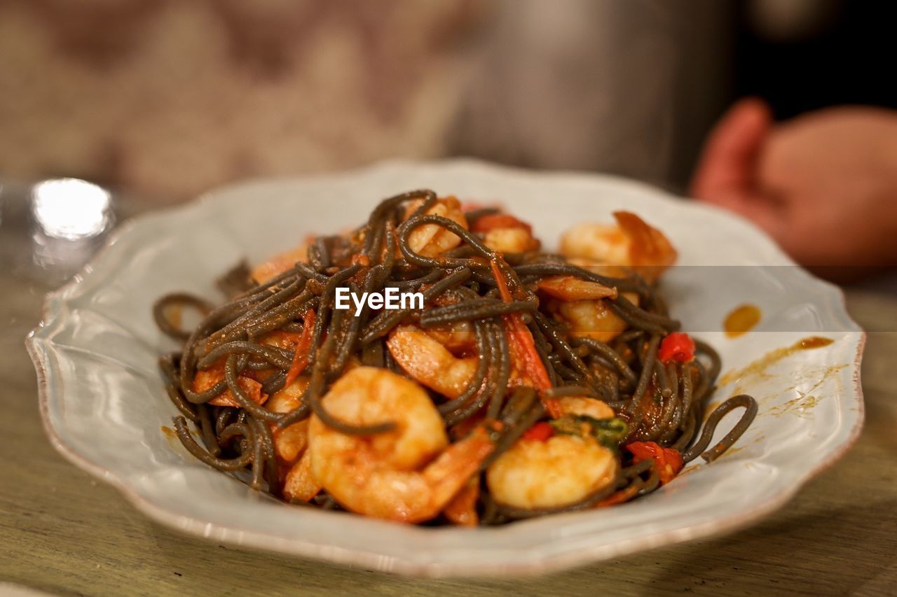 Close-up of prawns noodles served in plate