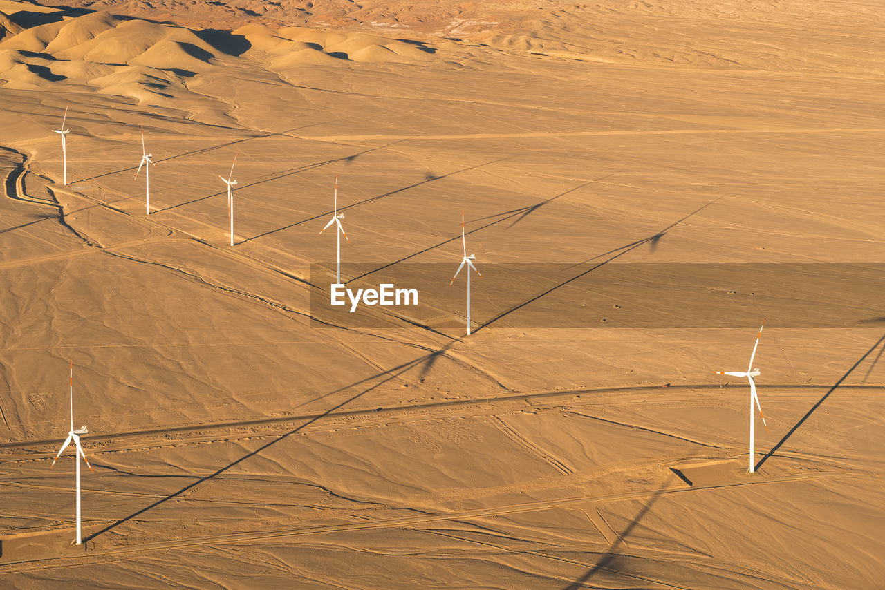 Aerial view of a wind farm in the atacama desert outside the city of calama, chile
