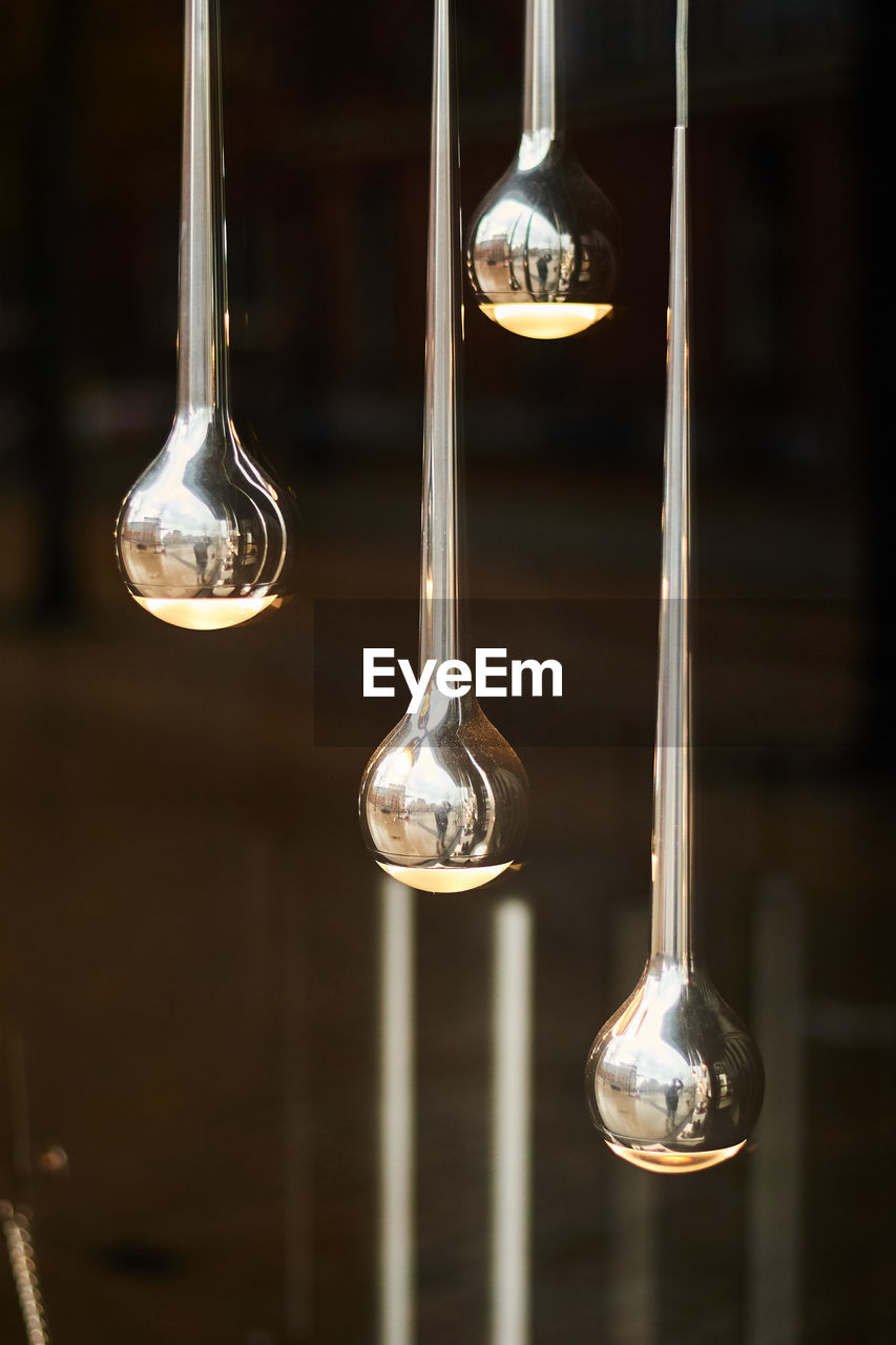 Silver decorations hanging for sale in store