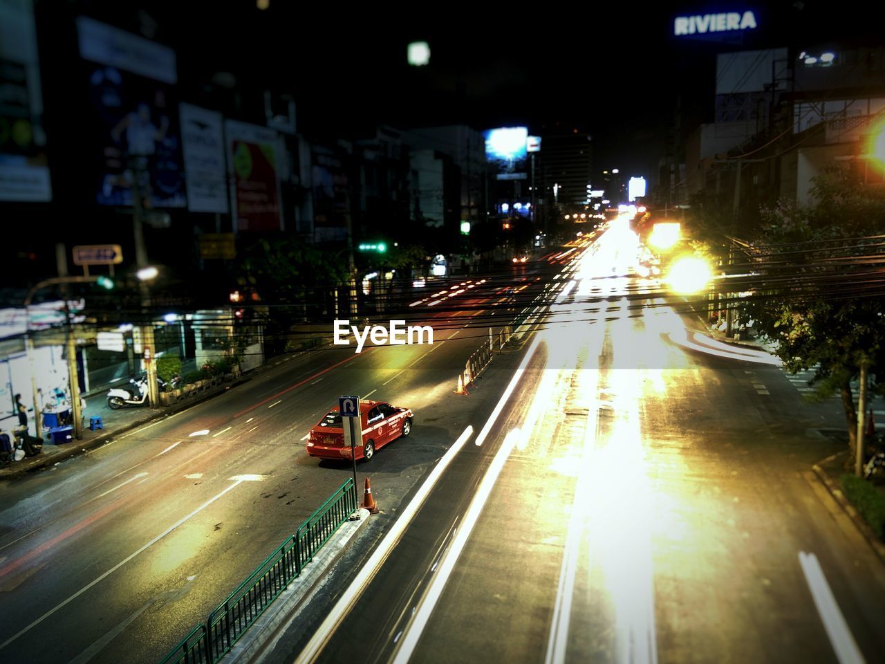 Traffic light trails on road at night