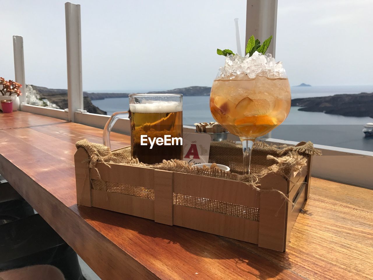 CLOSE-UP OF DRINK ON TABLE