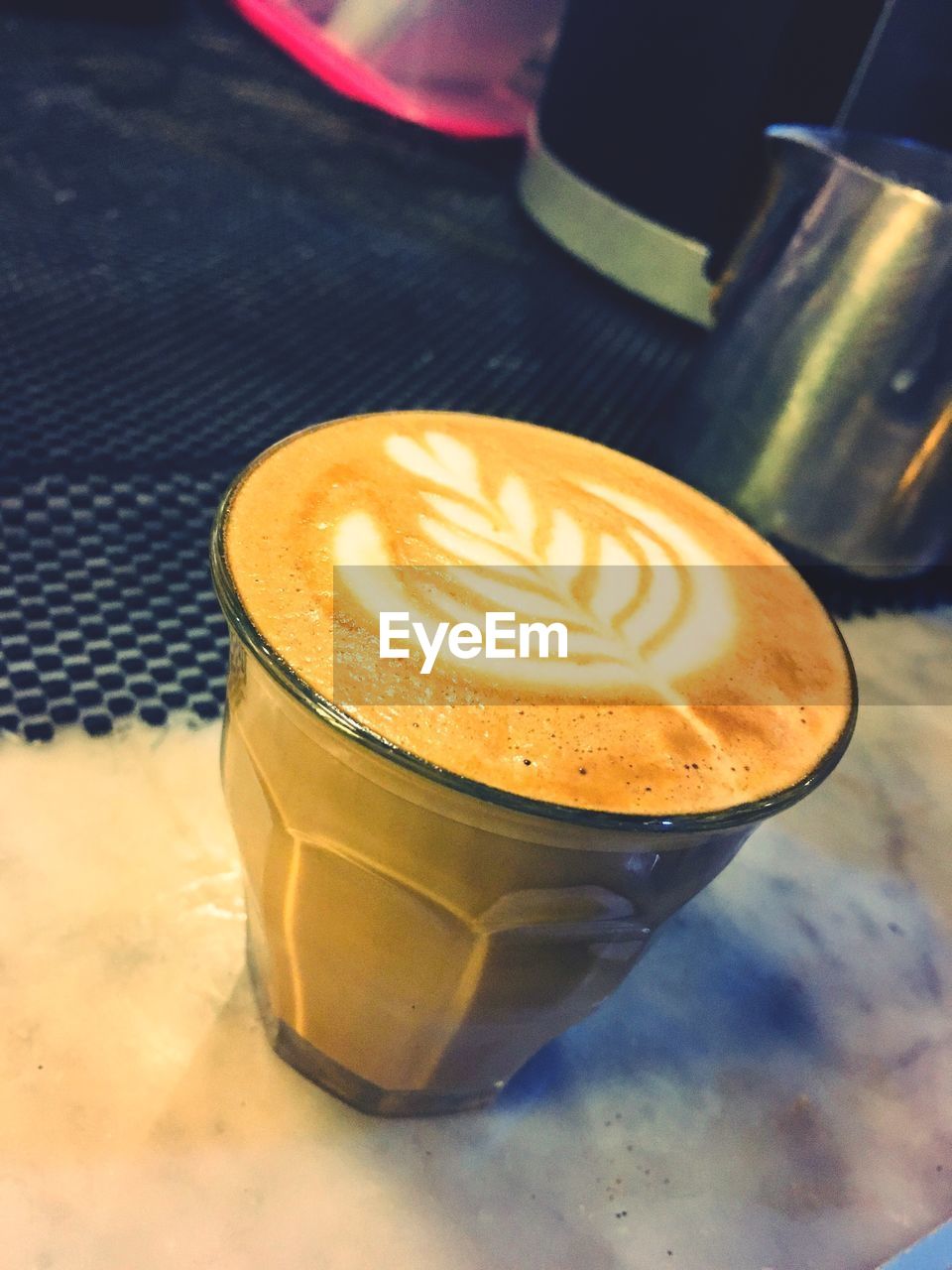 High angle view of cappuccino on table