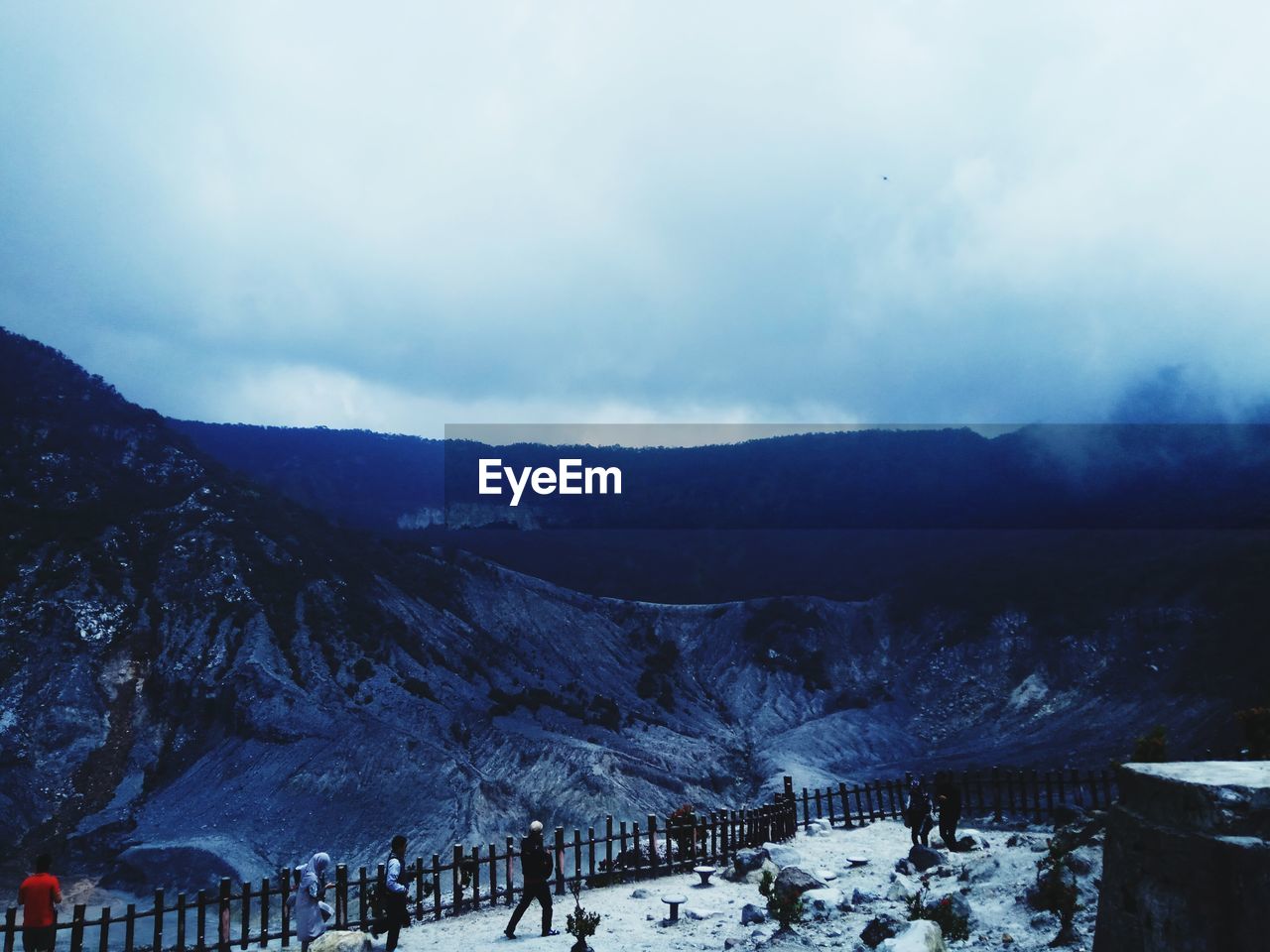 SCENIC VIEW OF MOUNTAINS AGAINST SKY DURING WINTER